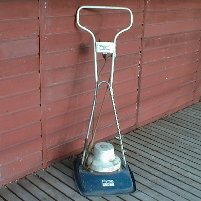 The Flymo Electric 15 was blue and white rather than the orange of the modern machines from the company.