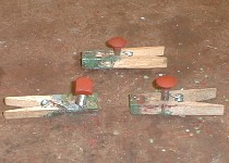 Clothes pegs are useful for holding small parts when painting.