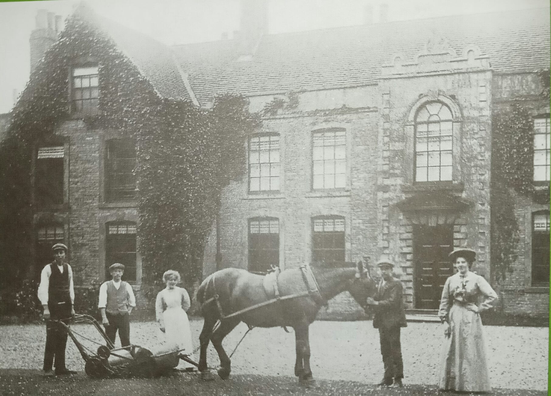 Horse drawn mower, servants, large house