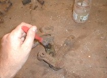 Apply stripper with an old brush to help remove paint.